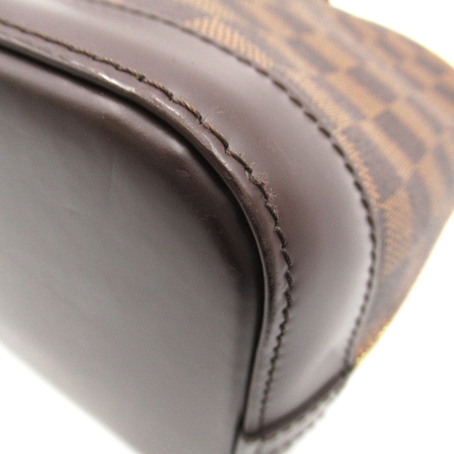 LOUIS VUITTON Alma Handbag