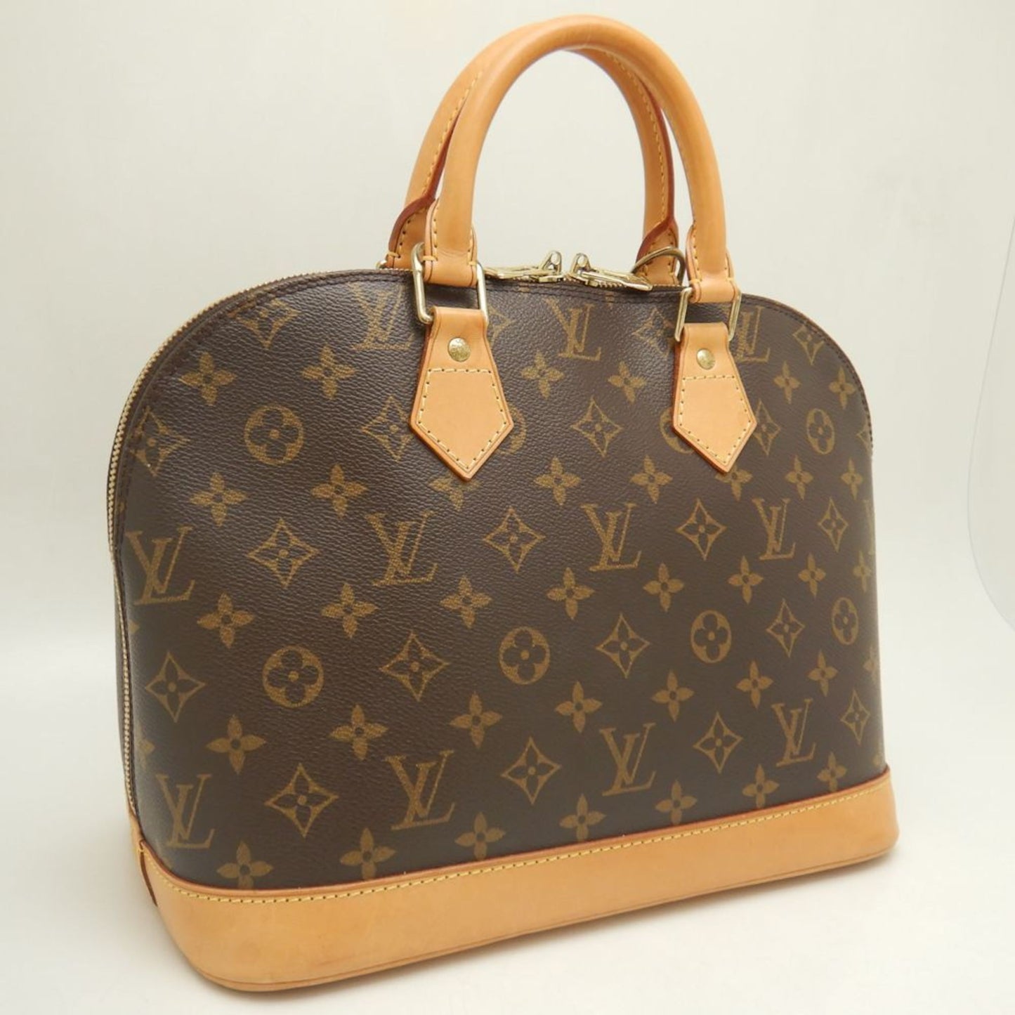 LOUIS VUITTON Alma Handbag