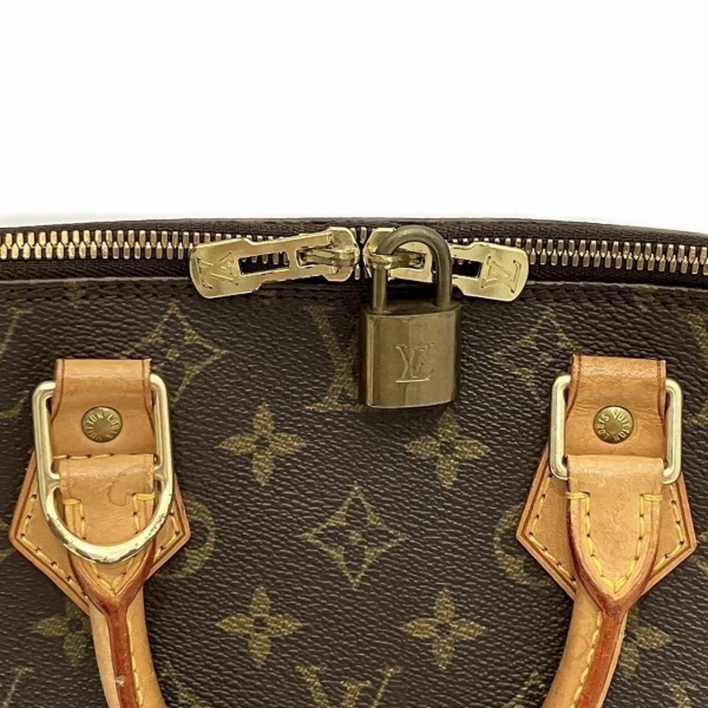 LOUIS VUITTON Alma Handbag