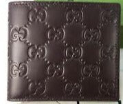 Gucci Signature Leather Bi-fold Wallet in Brown