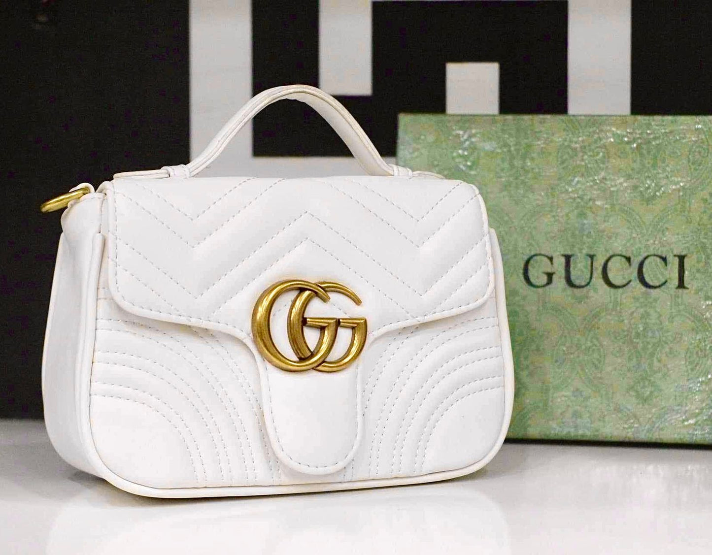 GUCCI GG Marmont Mini Top Handle Sling Bag (white)