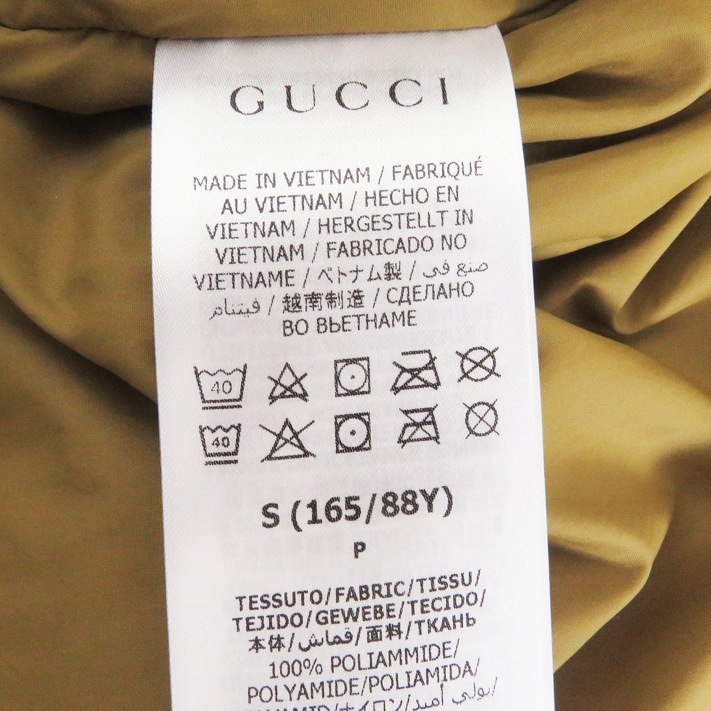GUCCI Down jacket 670603 Main: 100% nylon, Filling: 80% down, Filling: 20% feather, Applique: 100% polyester Ivory Multi mens S Used