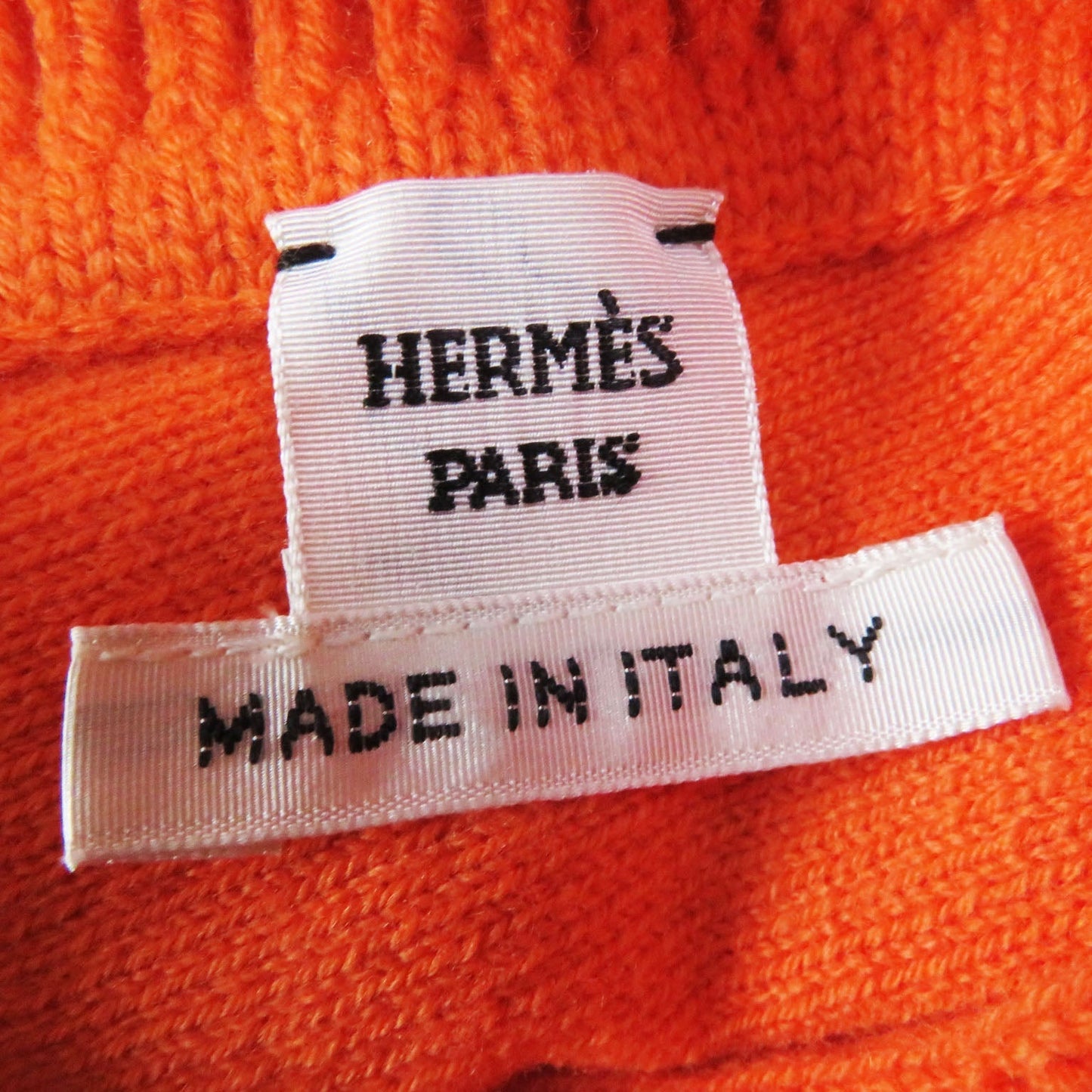 HERMES Down jacket Outer: 100% wool, Filling: 90% down, Filling: 10% feather, Lining: 100% polyester Orange Women 40 Used