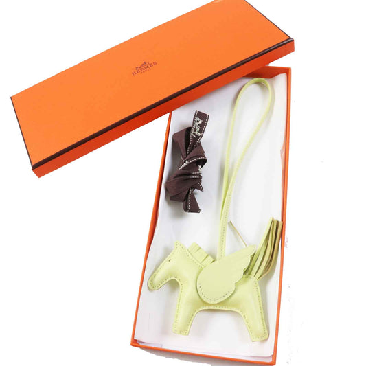 HERMES Bag charm Anjou Miro Vous Swift Light yellow Rodeo Charm Pegasus PM