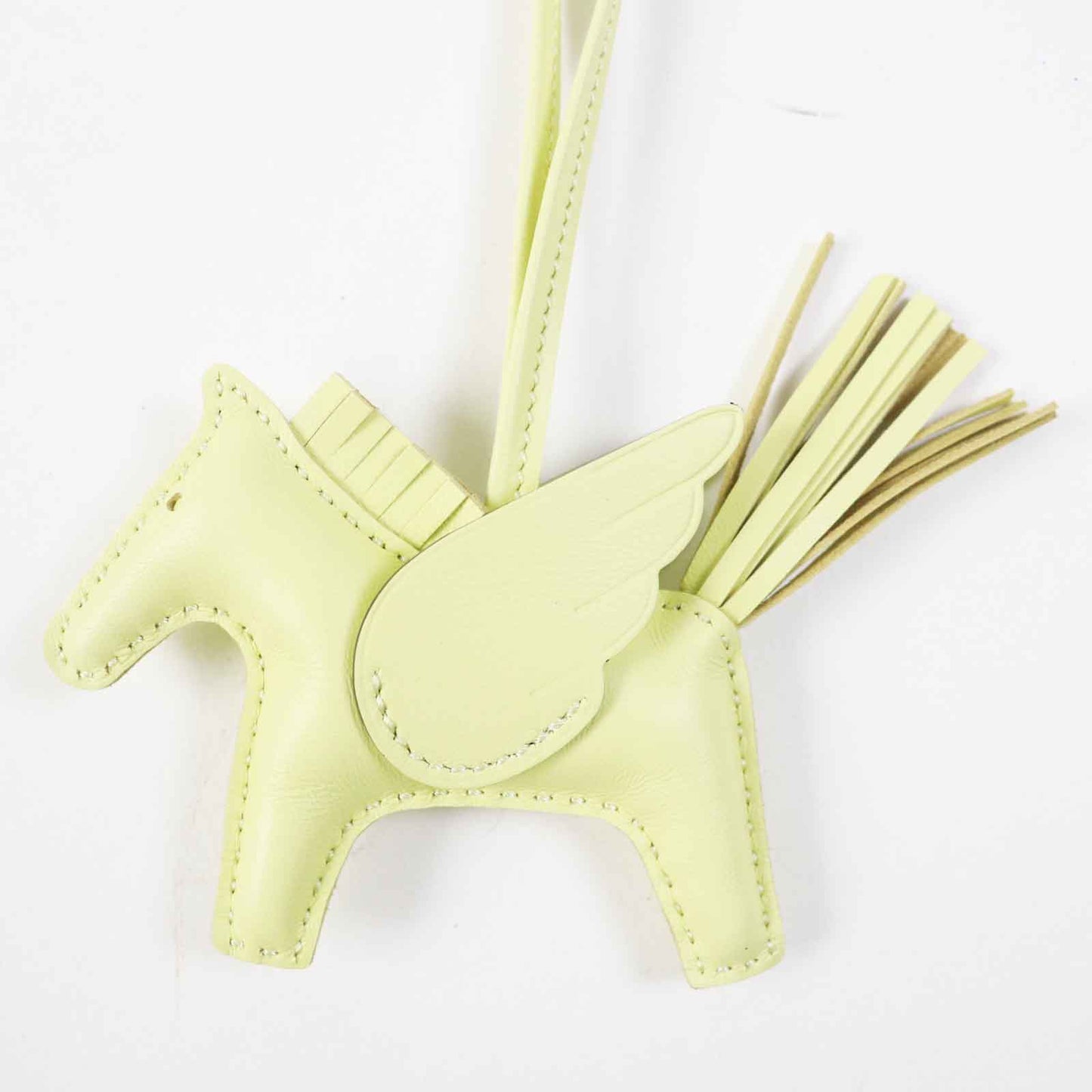 HERMES Bag charm Anjou Miro Vous Swift Light yellow Rodeo Charm Pegasus PM