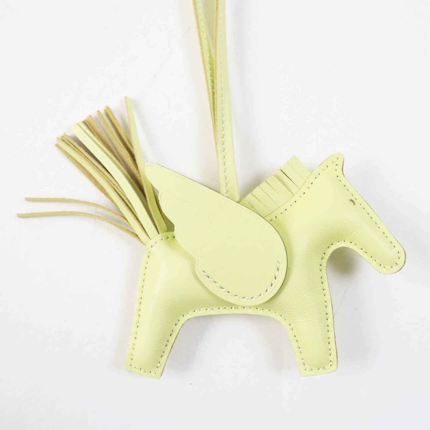 HERMES Bag charm Anjou Miro Vous Swift Light yellow Rodeo Charm Pegasus PM
