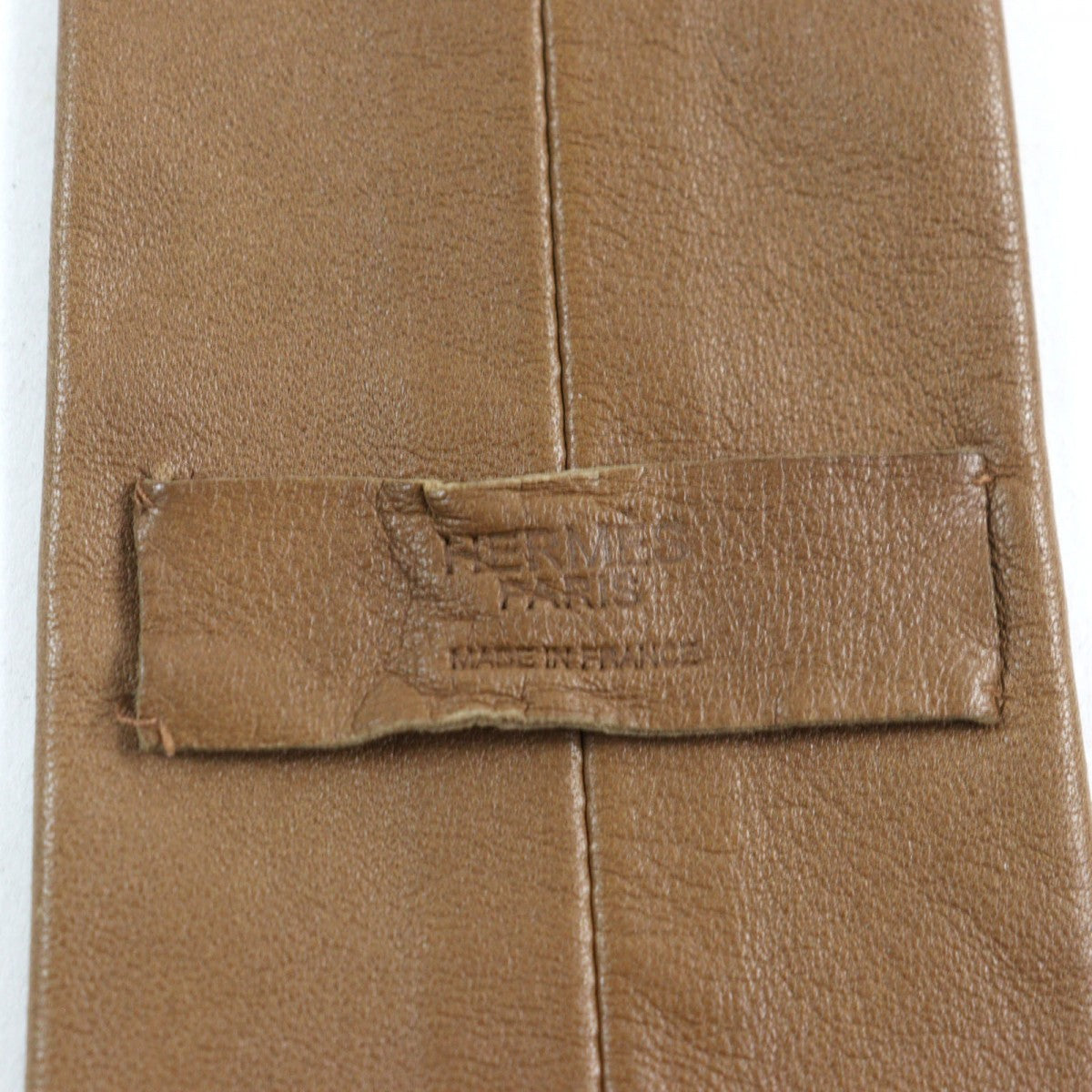 HERMES tie leather Brown