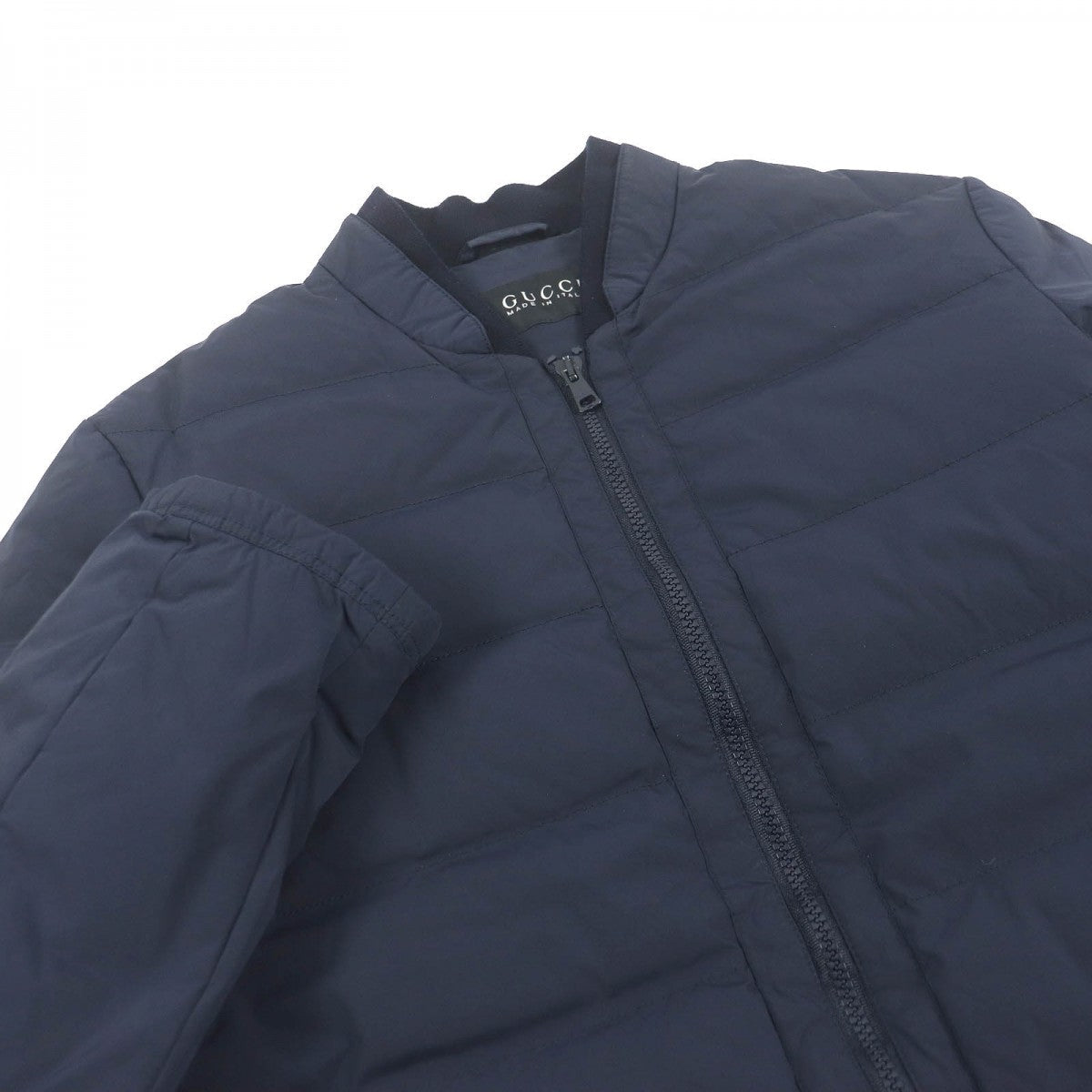 GUCCI Down jacket 322555 Main: 92% nylon, Main: 8% polyurethane, Part: 98% wool, Part: 2% polyurethane, Filling: 100% down Navy mens 44 Used