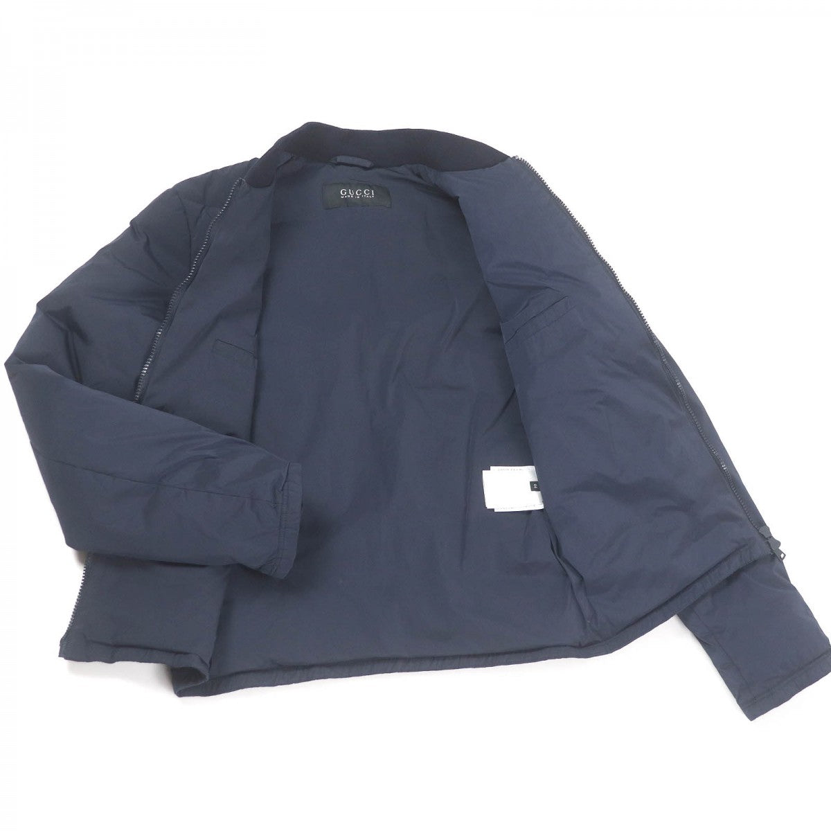 GUCCI Down jacket 322555 Main: 92% nylon, Main: 8% polyurethane, Part: 98% wool, Part: 2% polyurethane, Filling: 100% down Navy mens 44 Used