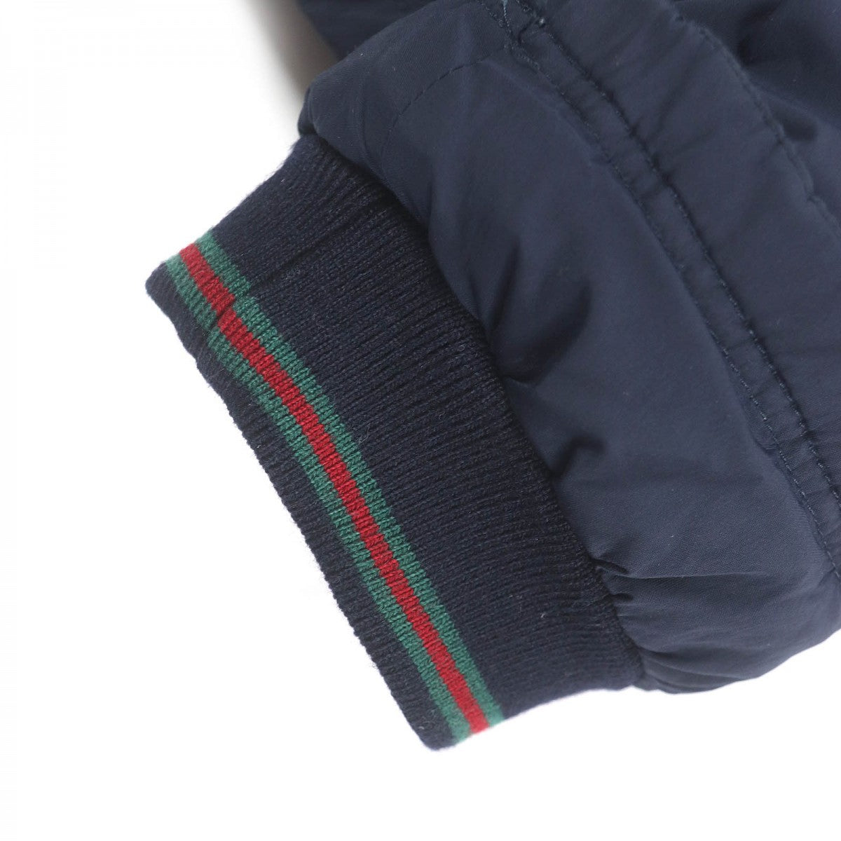 GUCCI Down jacket 322555 Main: 92% nylon, Main: 8% polyurethane, Part: 98% wool, Part: 2% polyurethane, Filling: 100% down Navy mens 44 Used