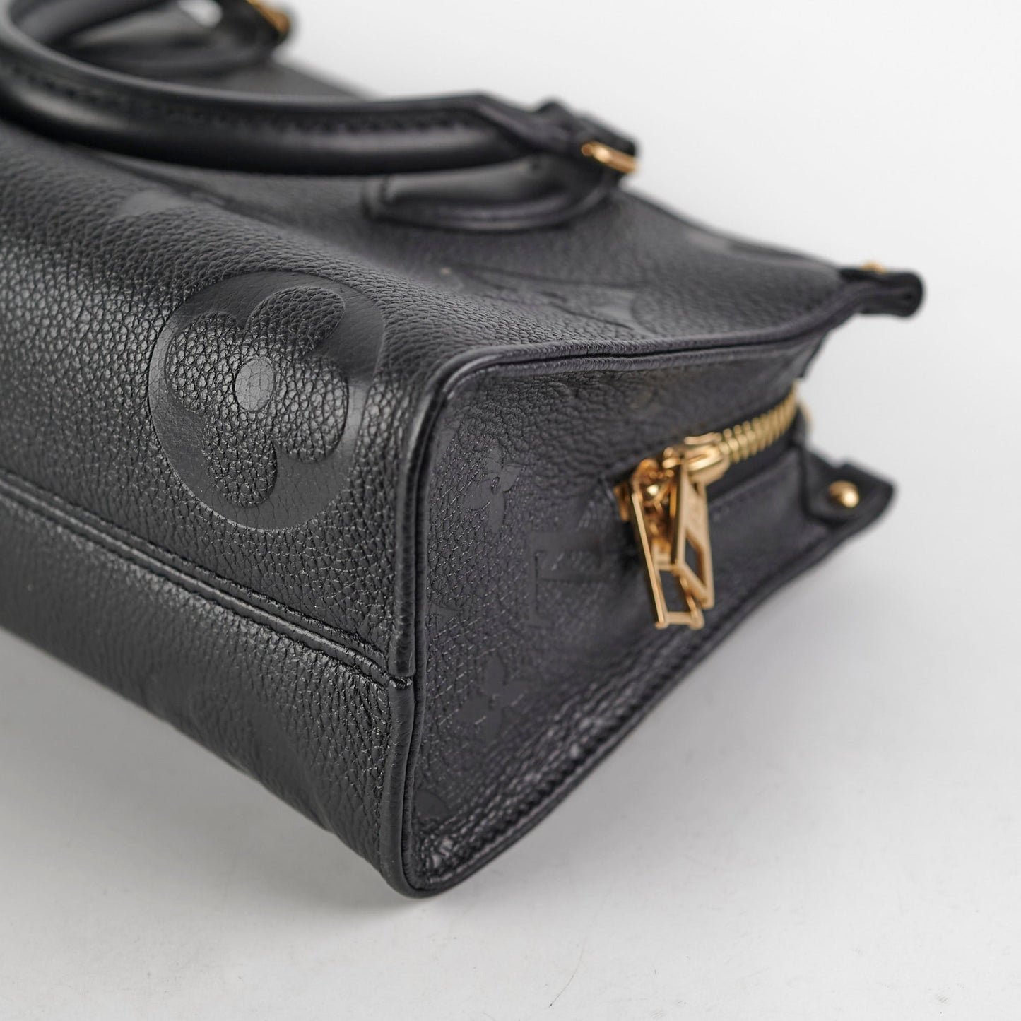 ITEM 31 - Louis Vuitton On The Go East West Empreinte Black