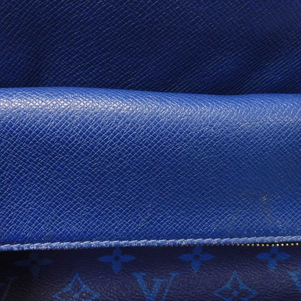 LOUIS VUITTON Backpack M30229 Taiga leather x monogram canvas cobalt Taiga Lama Monogram Discovery PM