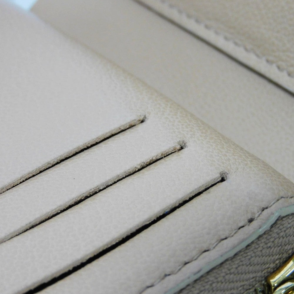 LOUIS VUITTON Bifold Wallet M81673 Lamb leather (monogram type push) x calf leather Camel Monogram emboss Portefeuille Lou