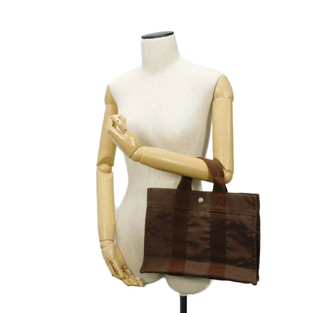 HERMES Tote Bag Nylon canvas (polyamide x polyester) Brown Serie button Her Line PM Tote mens(Unisex) Used
