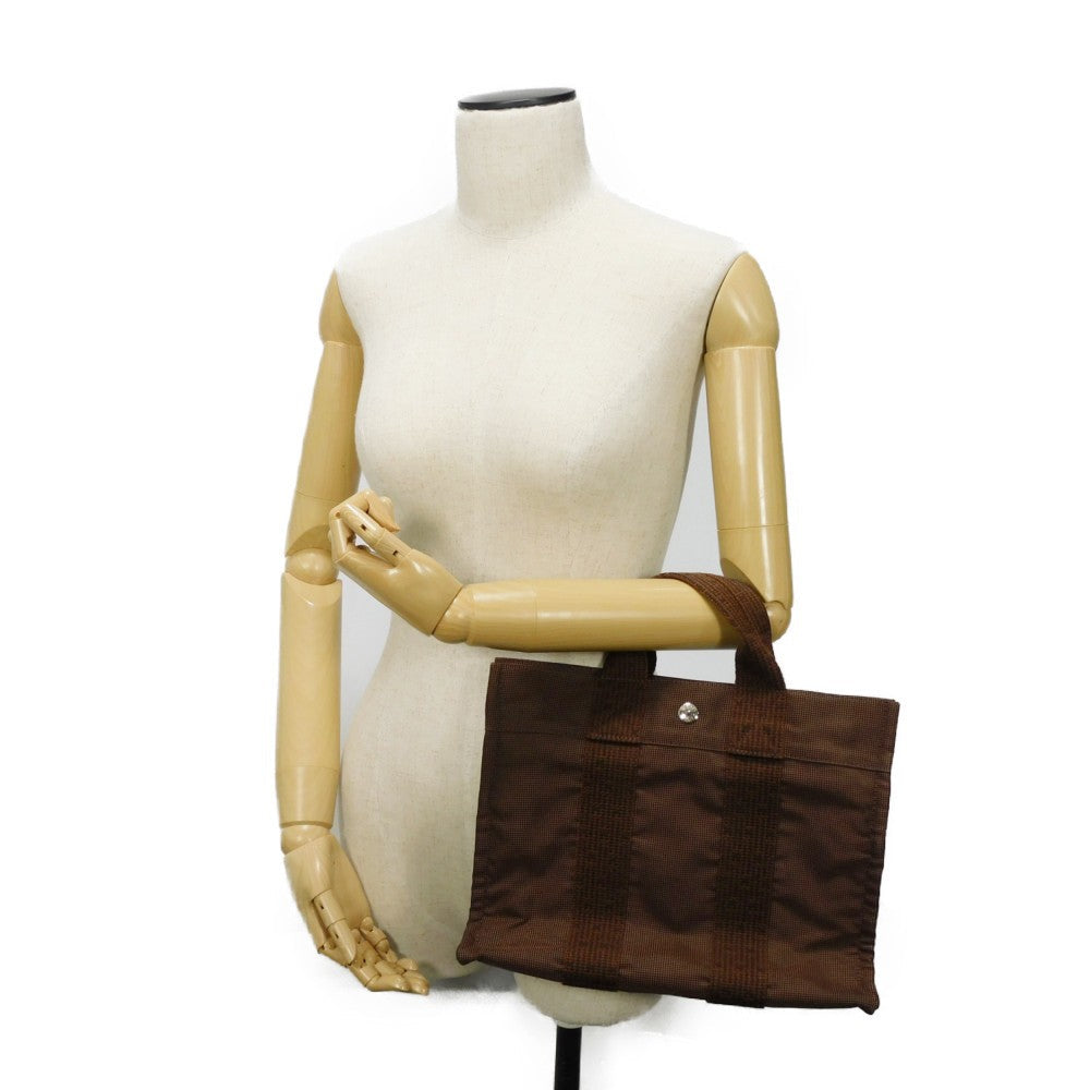 HERMES Tote Bag Nylon canvas (polyamide x polyester) Brown Serie button Her Line PM Tote mens(Unisex) Used