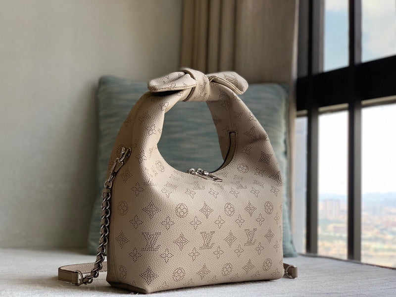 Alice Bags- Louis Vuittons  - 16385