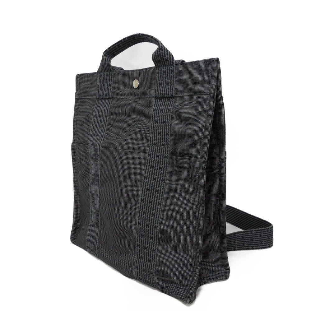 HERMES Backpack Nylon canvas (polyamide x polyester) Dark gray Serie button Her Line ad MM Women(Unisex) Used