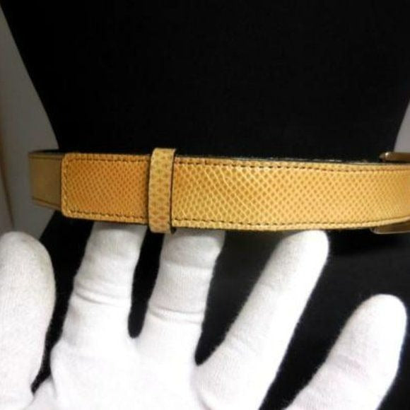 Gucci tan lizard leather belt w engraved chrome buckle