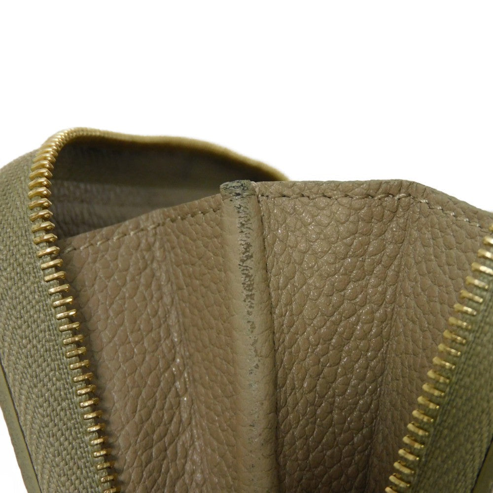 LOUIS VUITTON Coin case M82448 Implant leather (monogram embossed) khaki x claim Monogram Unplant Zip around purse Women Used