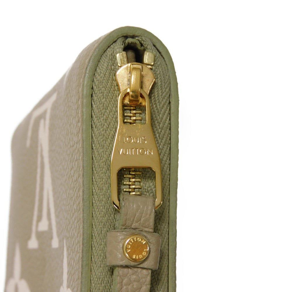 LOUIS VUITTON Coin case M82448 Implant leather (monogram embossed) khaki x claim Monogram Unplant Zip around purse Women Used