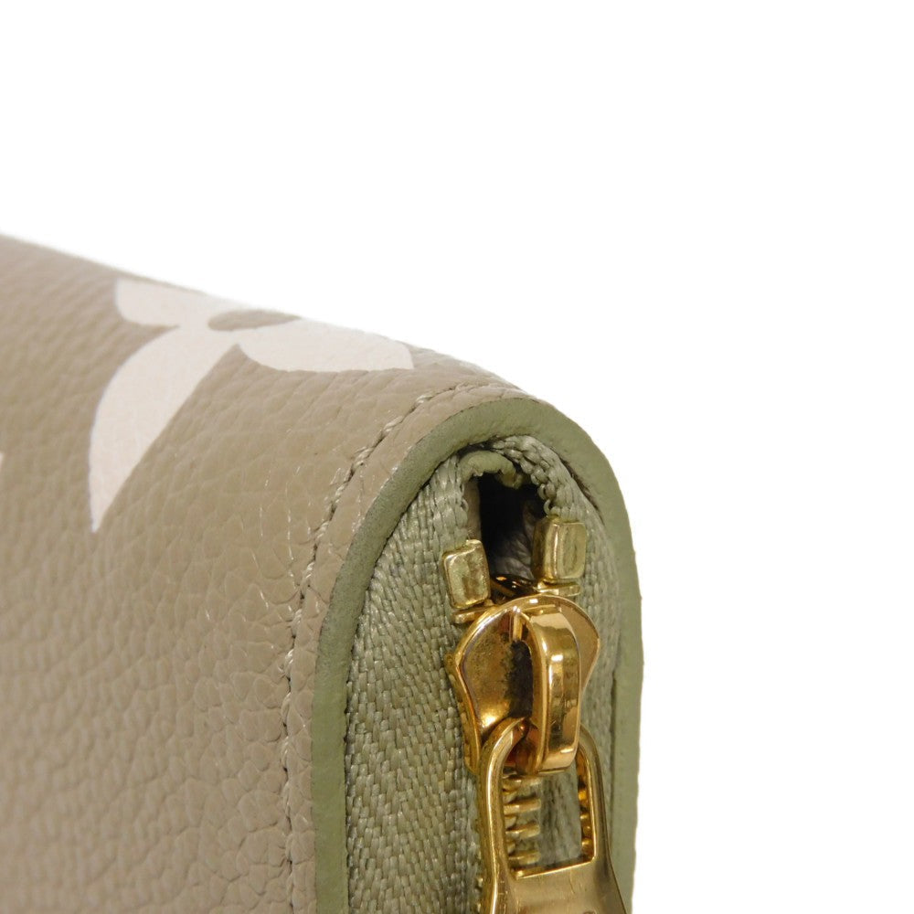 LOUIS VUITTON Coin case M82448 Implant leather (monogram embossed) khaki x claim Monogram Unplant Zip around purse Women Used