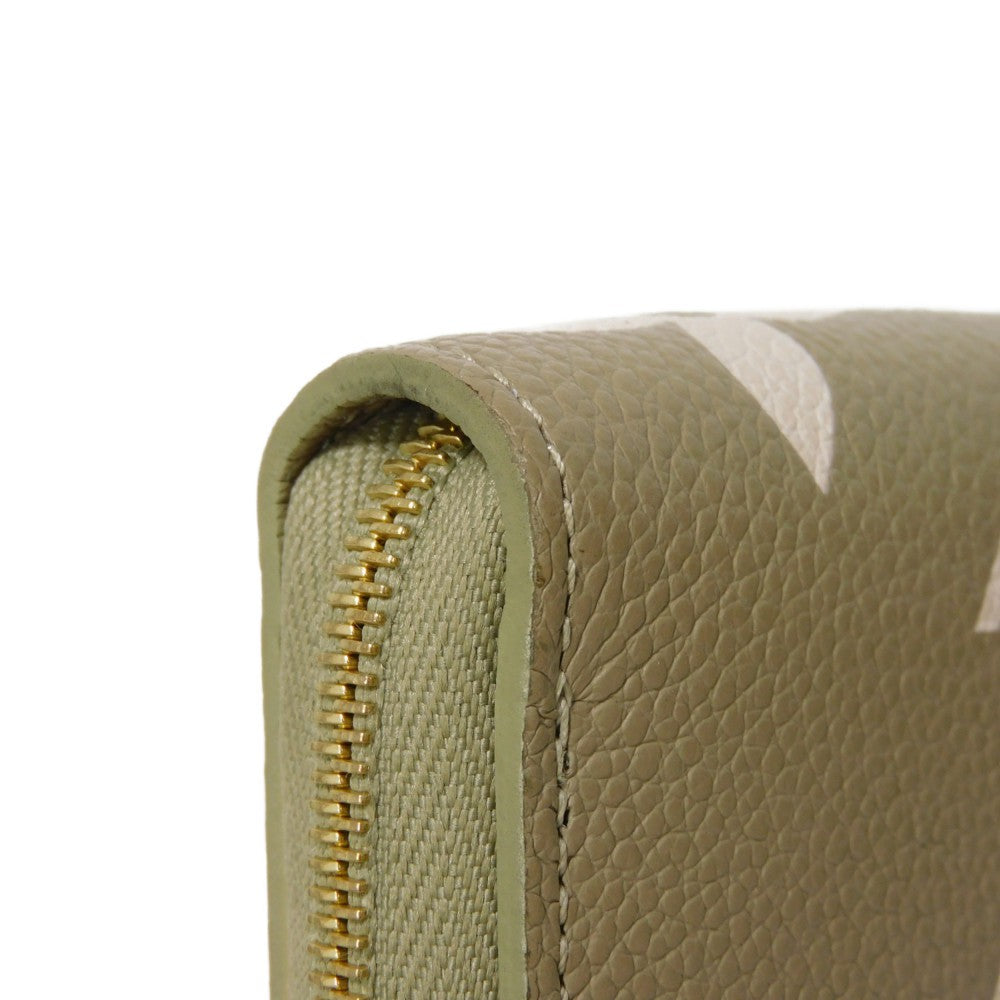 LOUIS VUITTON Coin case M82448 Implant leather (monogram embossed) khaki x claim Monogram Unplant Zip around purse Women Used