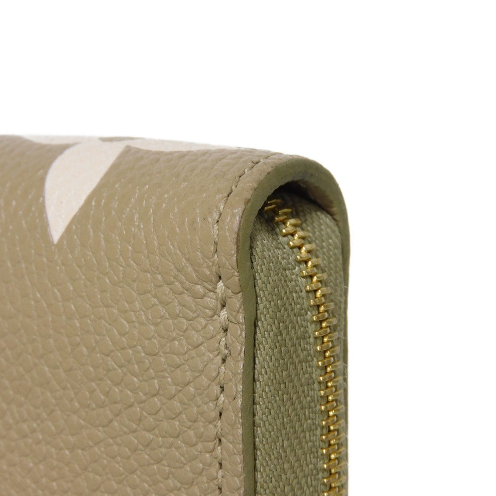 LOUIS VUITTON Coin case M82448 Implant leather (monogram embossed) khaki x claim Monogram Unplant Zip around purse Women Used