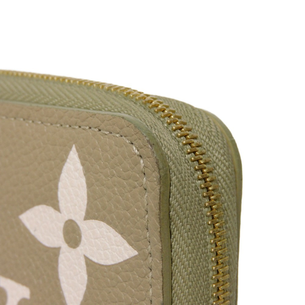 LOUIS VUITTON Coin case M82448 Implant leather (monogram embossed) khaki x claim Monogram Unplant Zip around purse Women Used