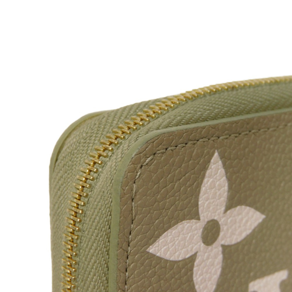 LOUIS VUITTON Coin case M82448 Implant leather (monogram embossed) khaki x claim Monogram Unplant Zip around purse Women Used