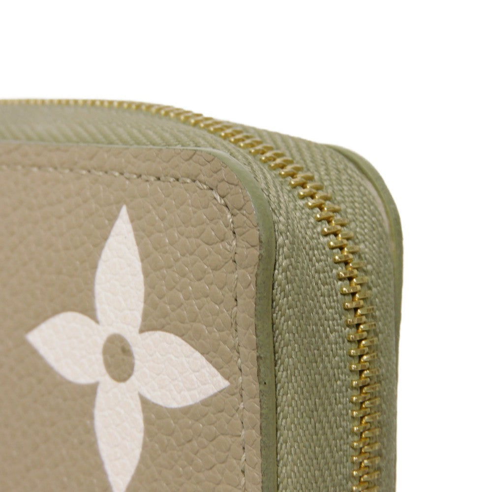 LOUIS VUITTON Coin case M82448 Implant leather (monogram embossed) khaki x claim Monogram Unplant Zip around purse Women Used