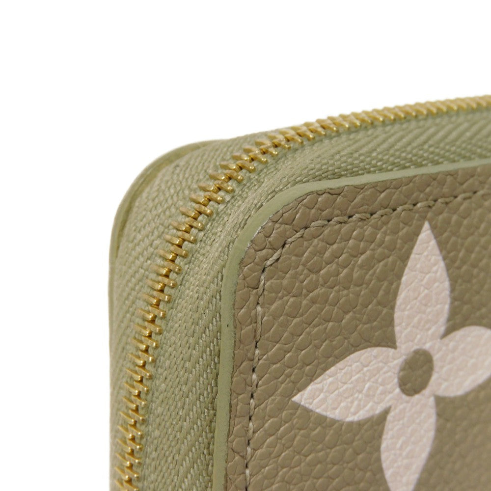 LOUIS VUITTON Coin case M82448 Implant leather (monogram embossed) khaki x claim Monogram Unplant Zip around purse Women Used
