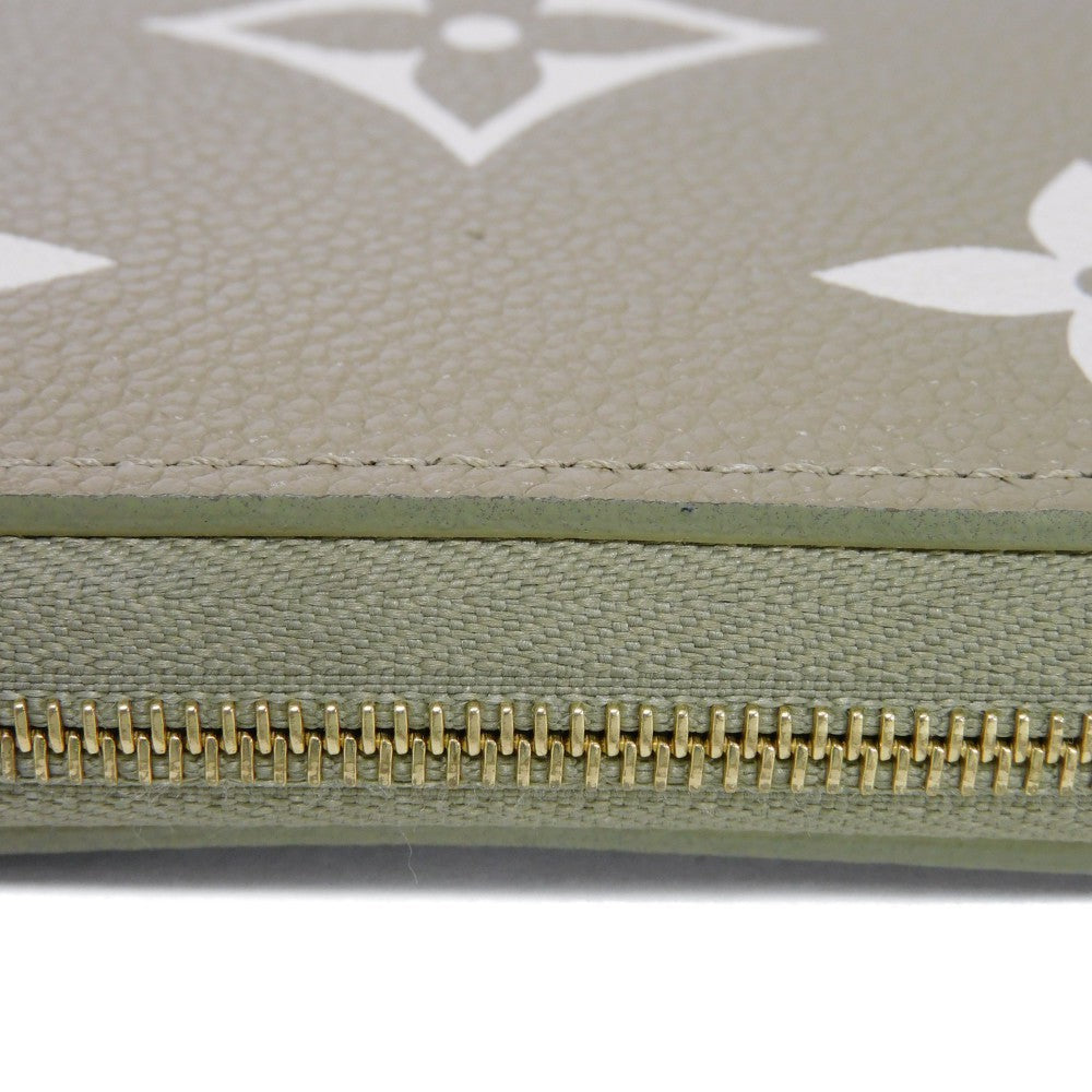LOUIS VUITTON Coin case M82448 Implant leather (monogram embossed) khaki x claim Monogram Unplant Zip around purse Women Used