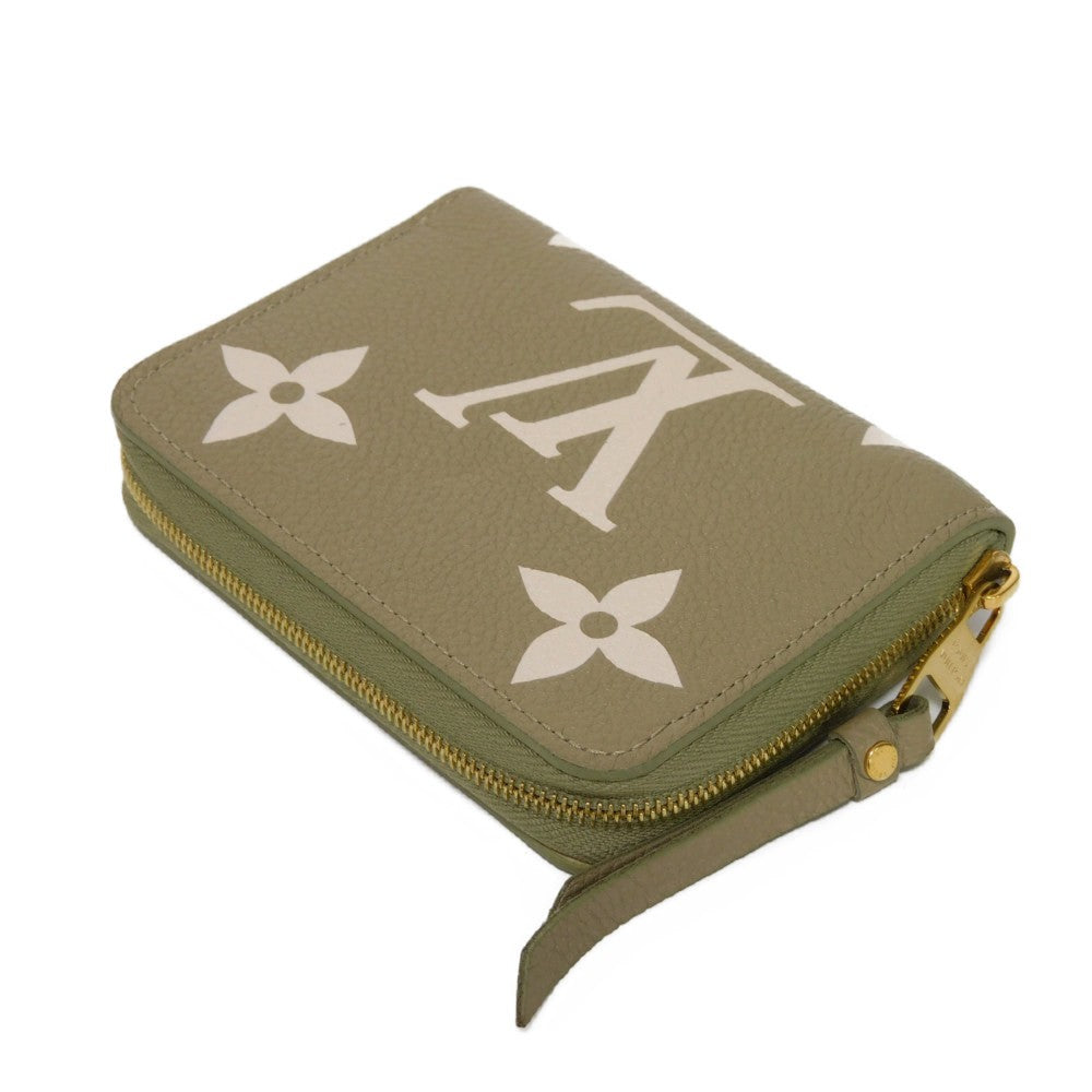 LOUIS VUITTON Coin case M82448 Implant leather (monogram embossed) khaki x claim Monogram Unplant Zip around purse Women Used