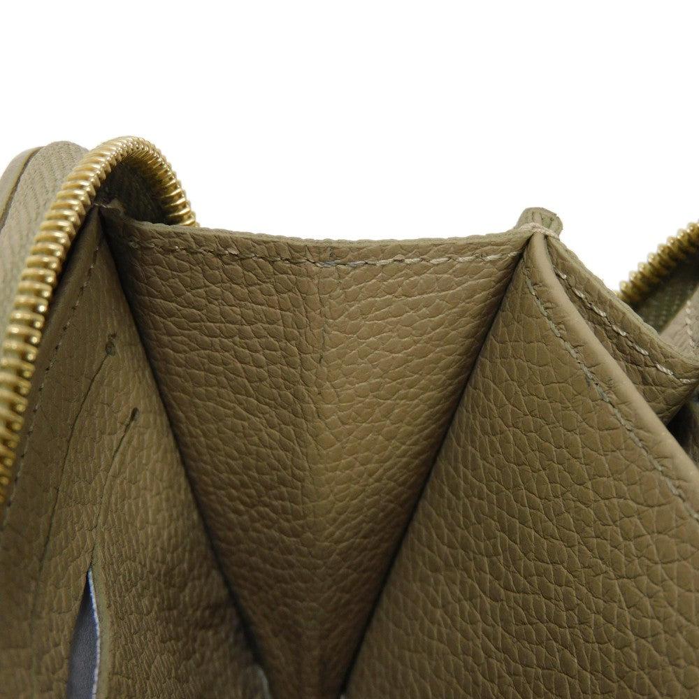 LOUIS VUITTON Coin case M82448 Implant leather (monogram embossed) khaki x claim Monogram Unplant Zip around purse Women Used