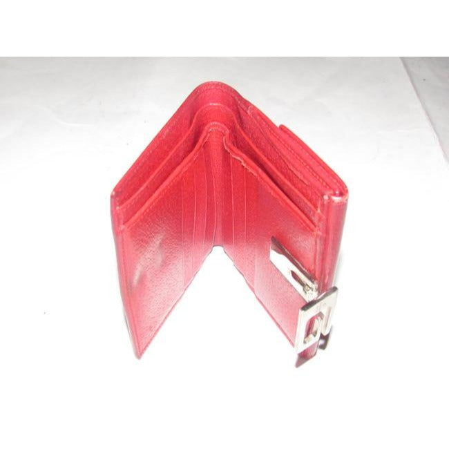Gucci, true red leather, bi-fold, wallet with a change purse, gold G hinged closure, and lots of interior card slots