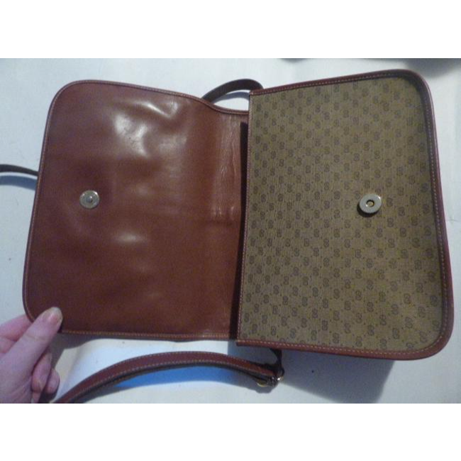 Gucci Vintage Pursesdesigner Purses Brown Leathersmall G Logo Print In Shades Of Brown With Redgreen