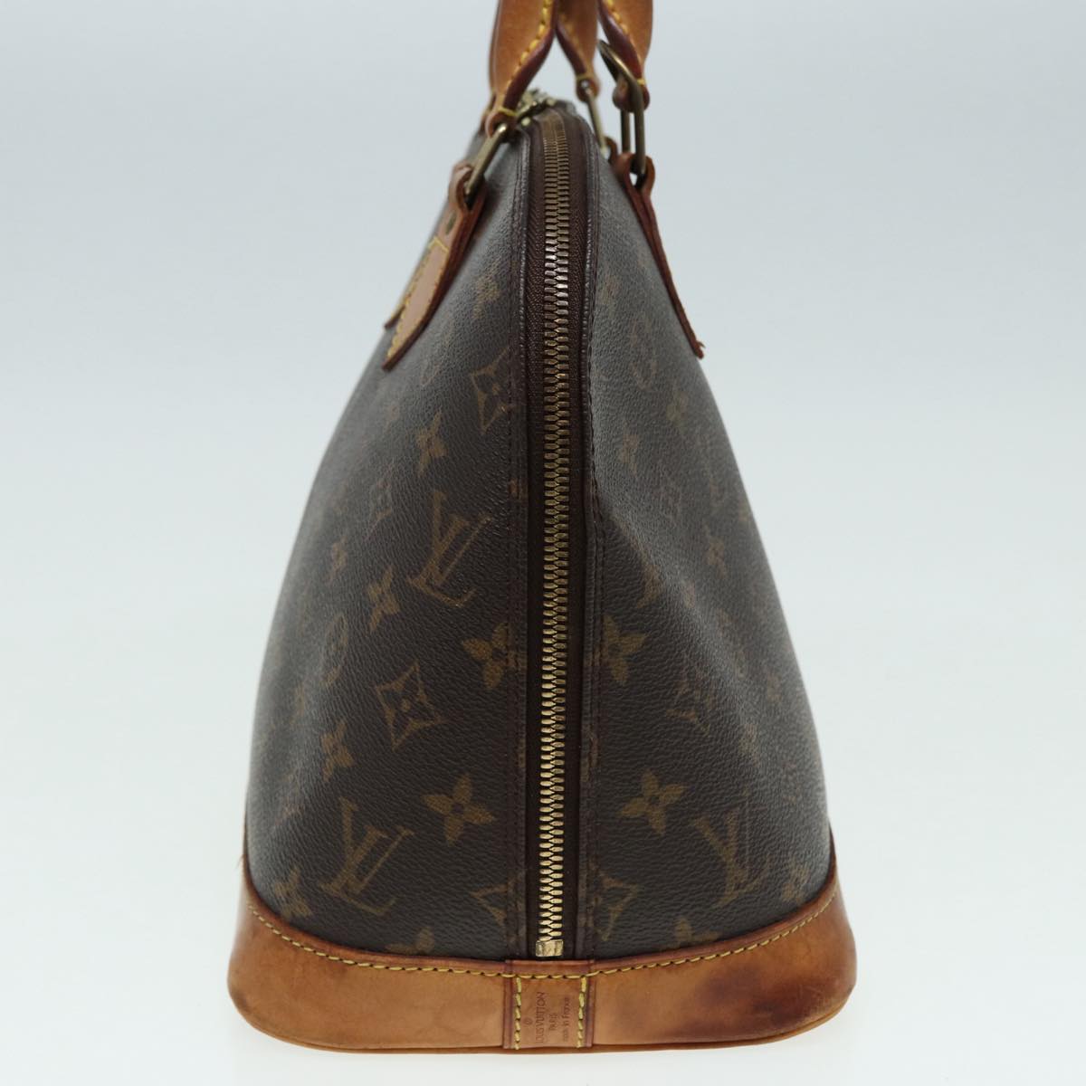 LOUIS VUITTON Alma Handbag