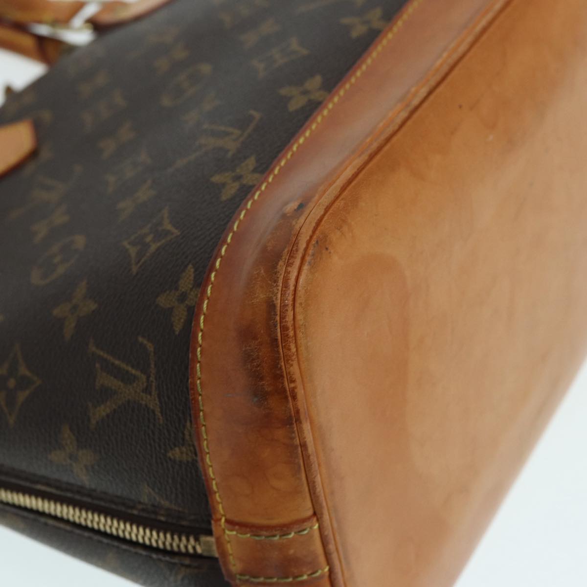 LOUIS VUITTON Alma Handbag