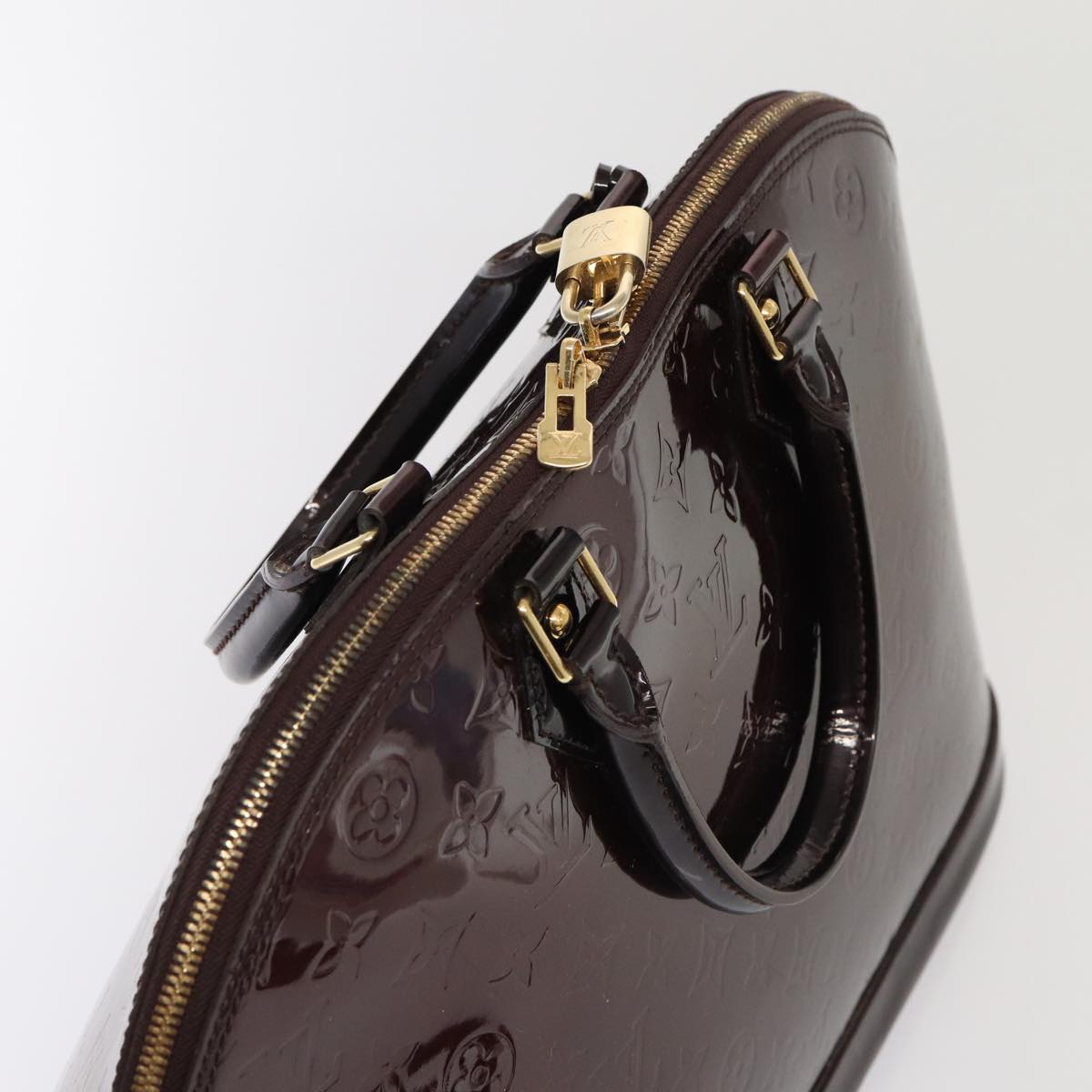 LOUIS VUITTON Alma Handbag