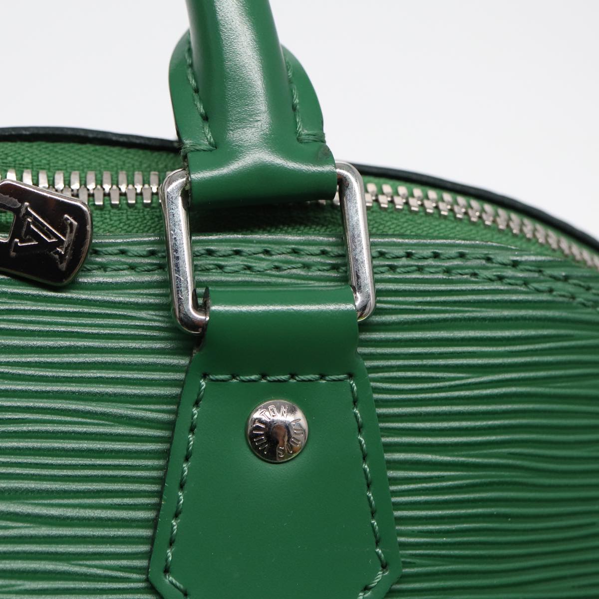 LOUIS VUITTON Alma Handbag