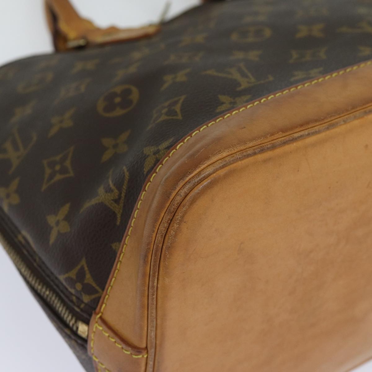 LOUIS VUITTON Alma Handbag