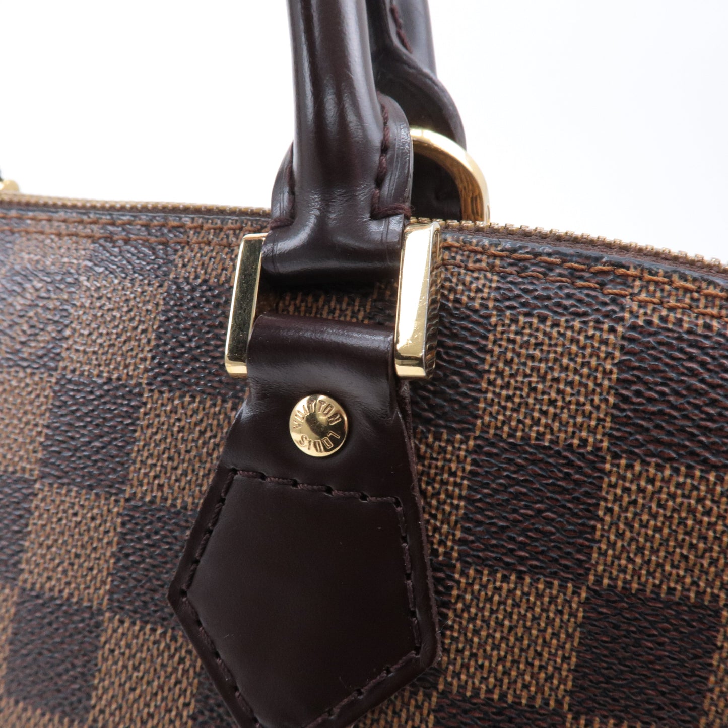 Louis Vuitton Damier Ebene Alma Hand Bag Brown N51131