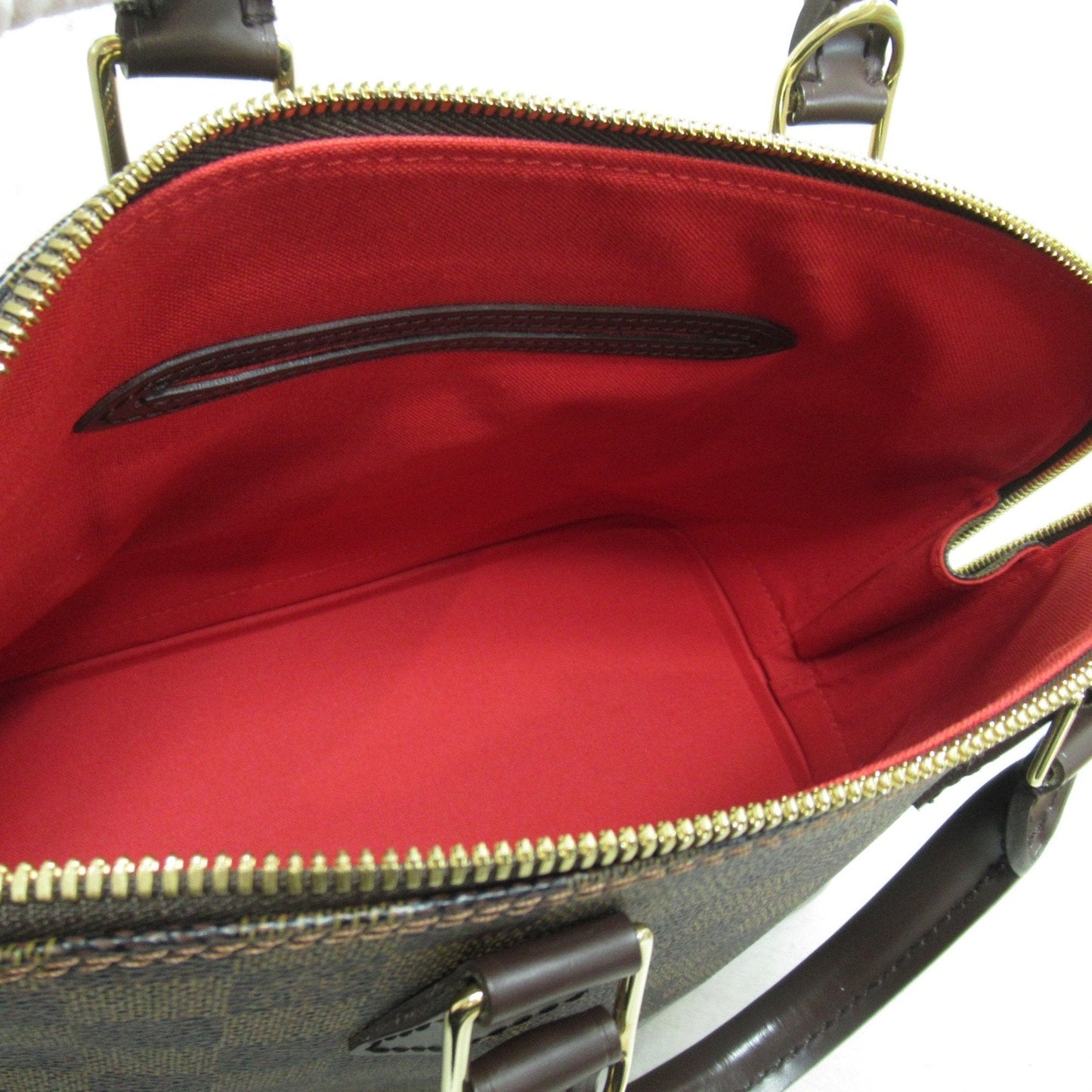 LOUIS VUITTON Alma Handbag