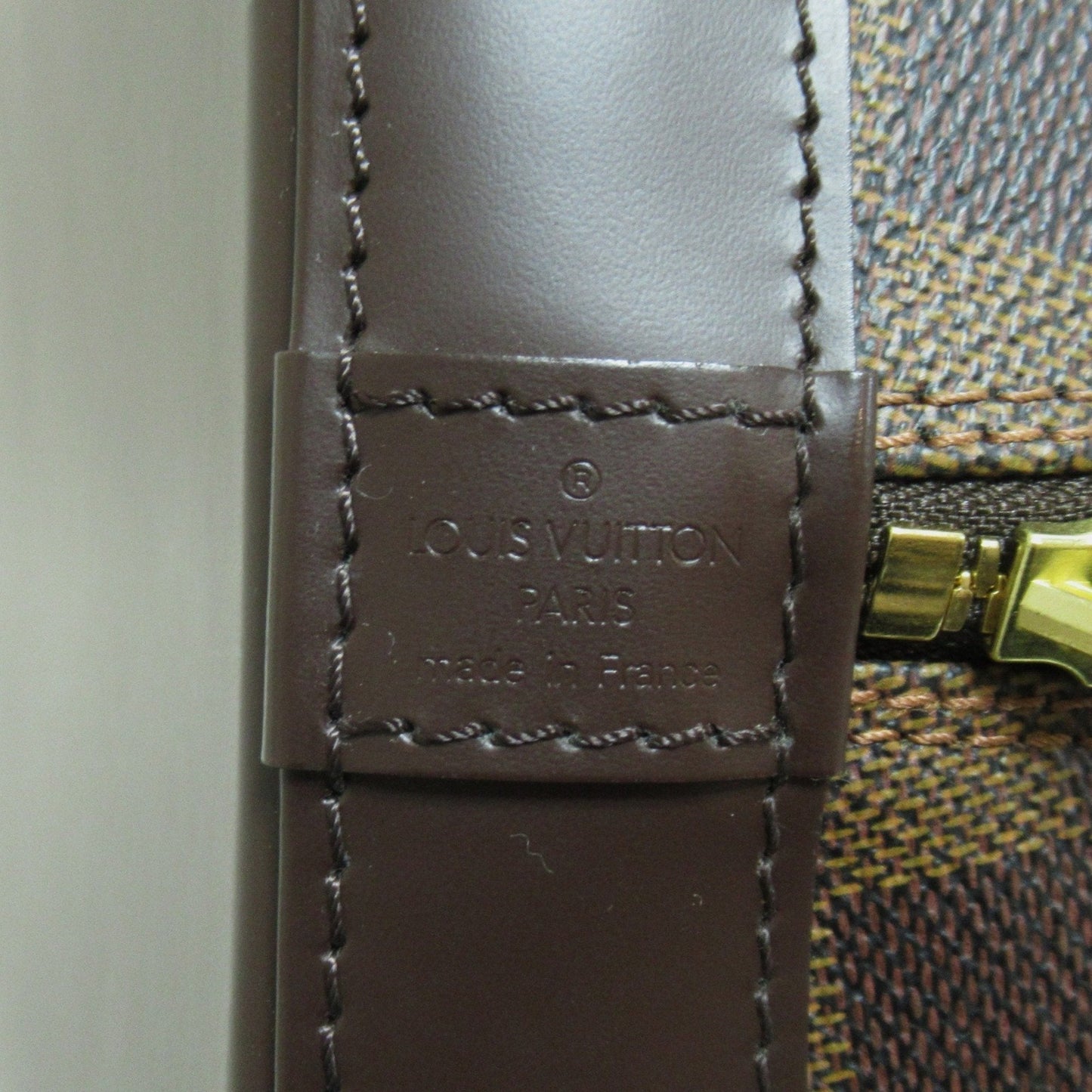 LOUIS VUITTON Alma Handbag
