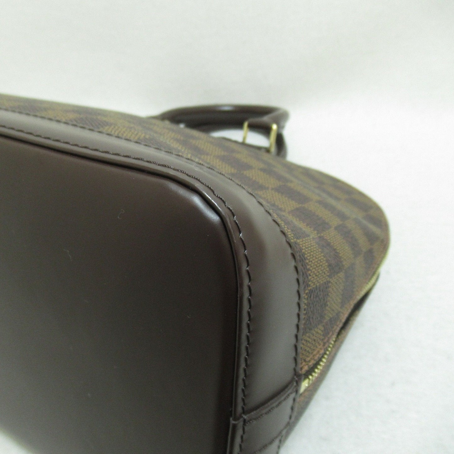 LOUIS VUITTON Alma Handbag