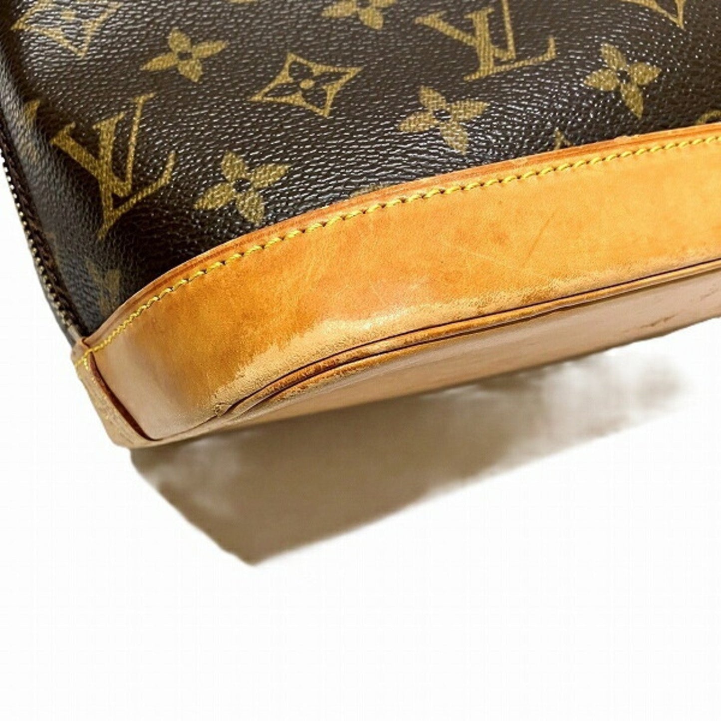 LOUIS VUITTON Alma Handbag