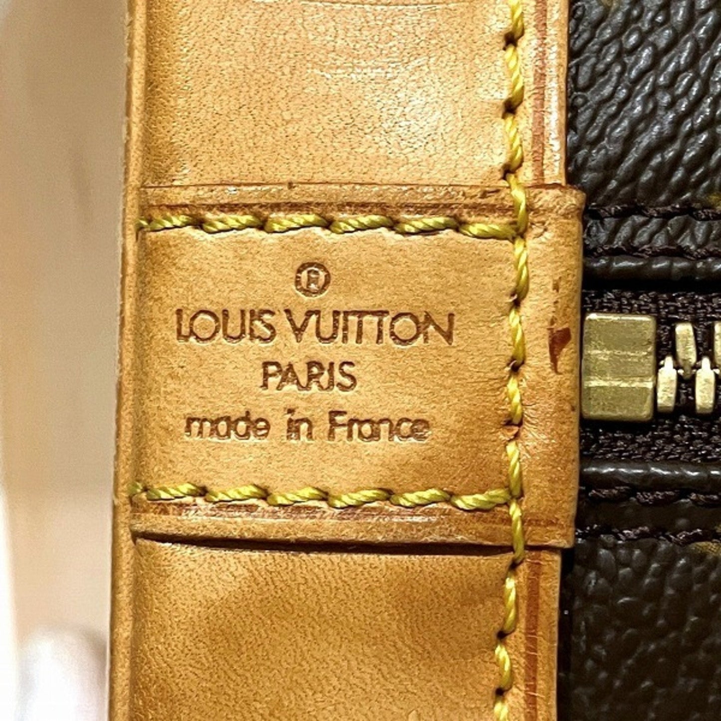 LOUIS VUITTON Alma Handbag