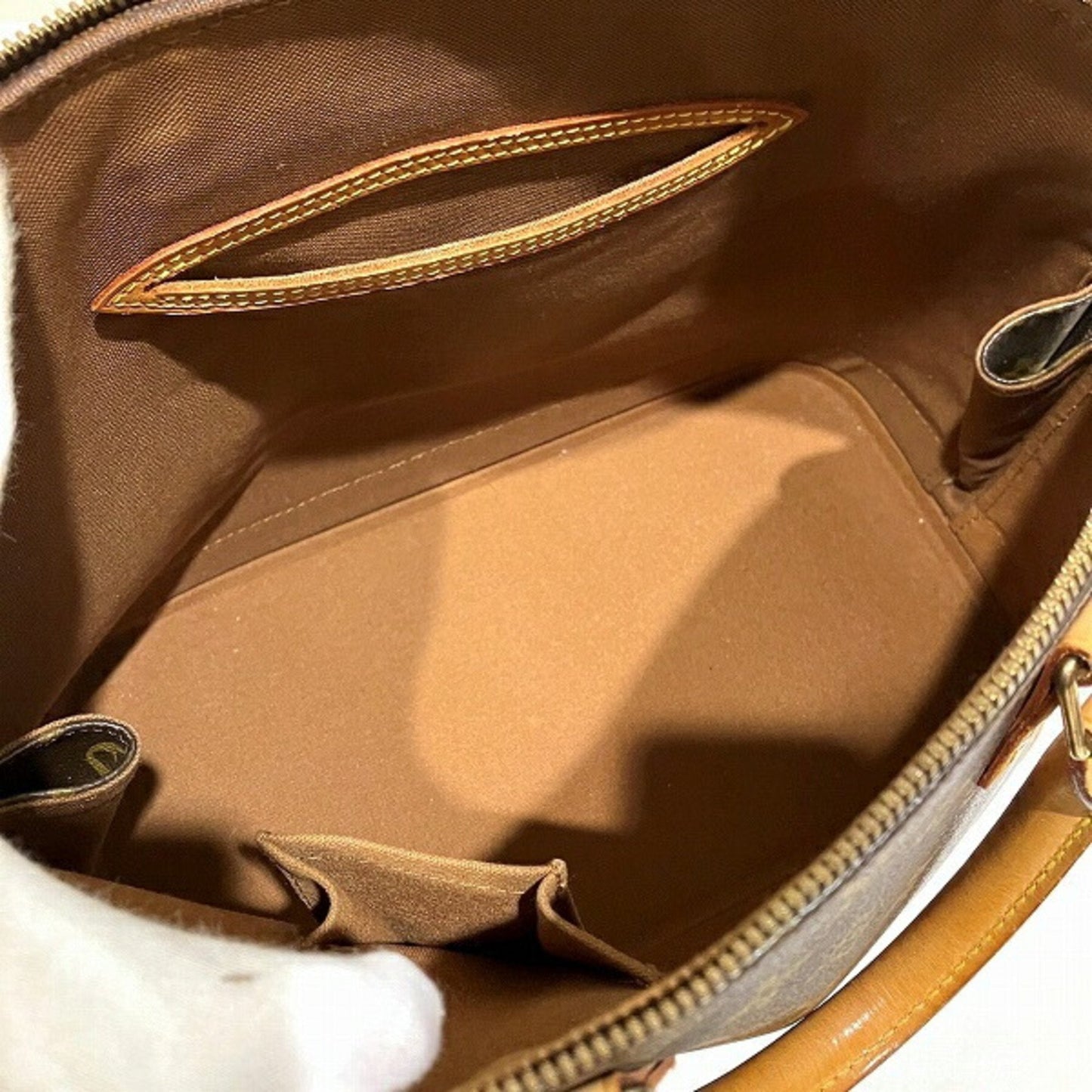LOUIS VUITTON Alma Handbag