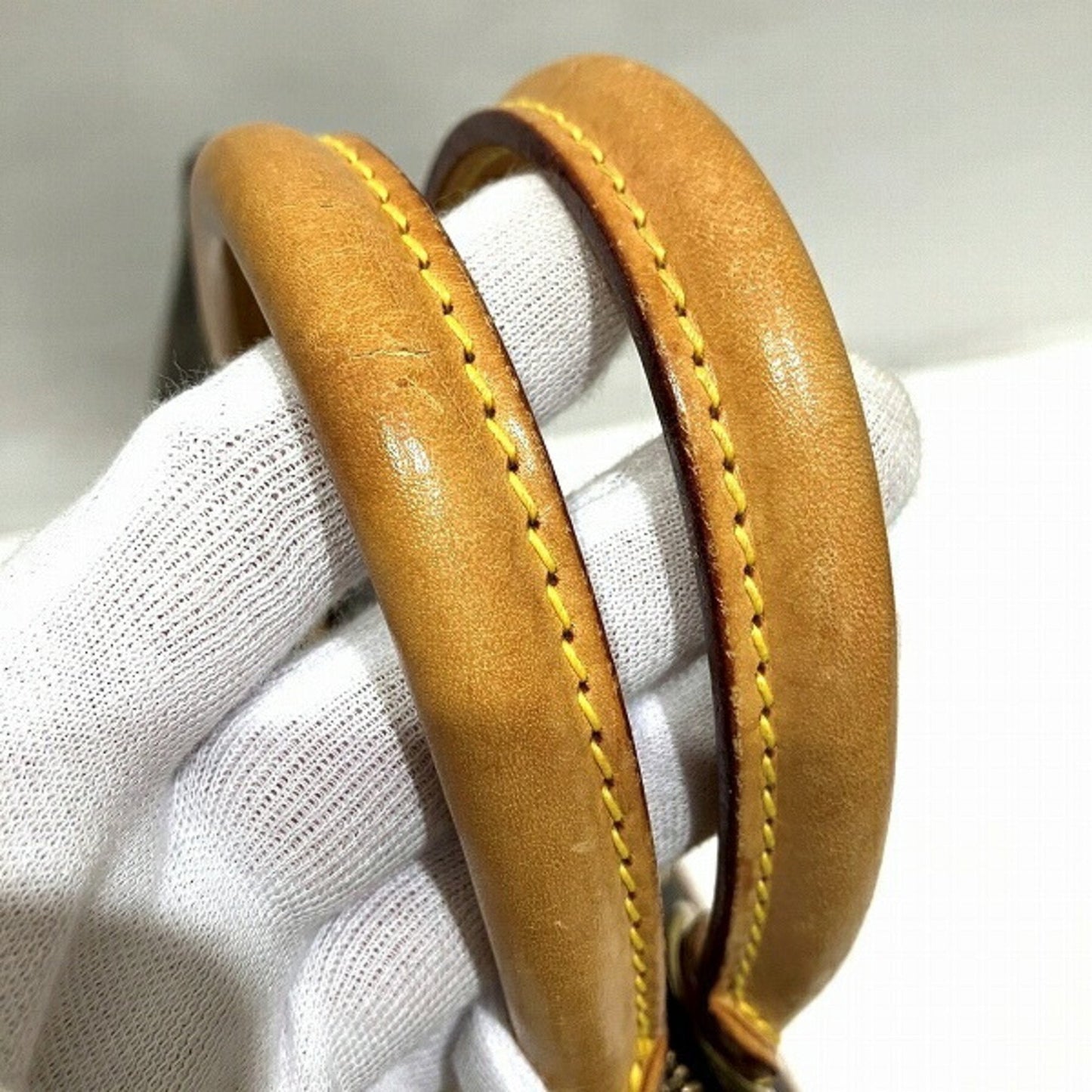 LOUIS VUITTON Alma Handbag