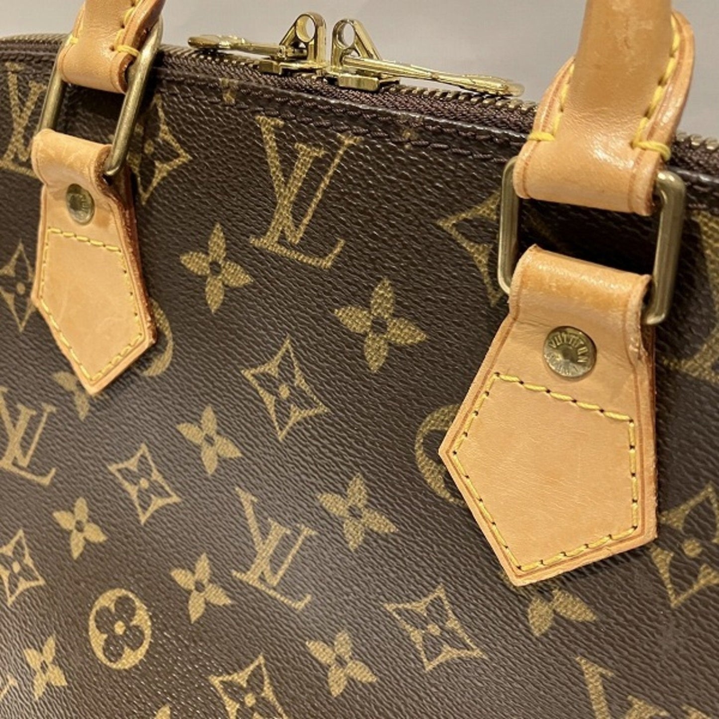 LOUIS VUITTON Alma Handbag